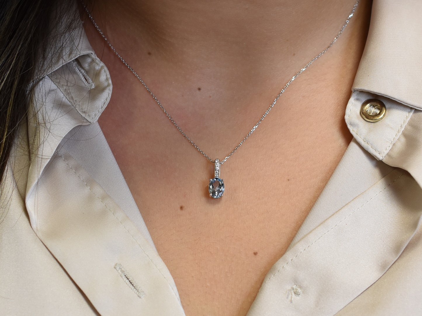 14k gold Oval aquamarine and diamond pendant