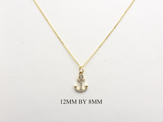 14k Gold and diamond Anchor necklace pendant with a 14k solid gold cable link chain, the diamonds are prong set and bezel set sliding on the chain displayed on a white background