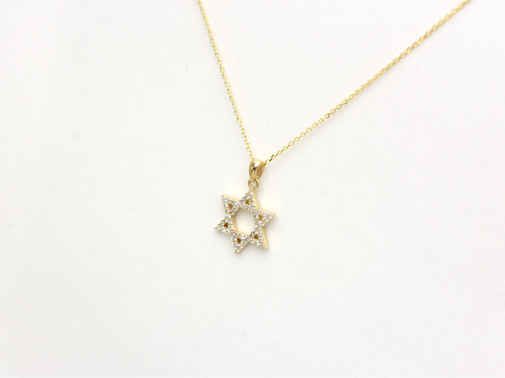 A gold-colored necklace with a Star of David pendant. The pendant is 15 mm in size and is encrusted with white diamonds. The chain is delicate and hangs against a white background.
