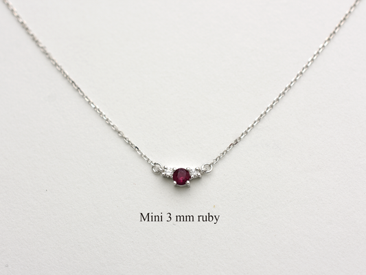 14k gold diamond and ruby necklace . past present and future design mini size pendant. the chain is a 0.8 mm cable link chain dainty and everyday look on a white background