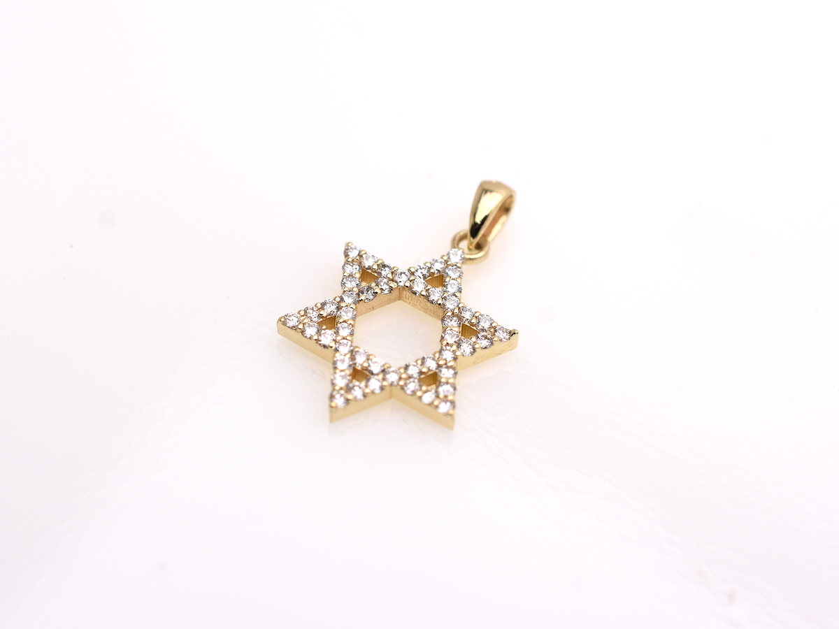 A gold-colored necklace with a Star of David pendant. The pendant is 15 mm in size and is encrusted with small, clear gemstones. 