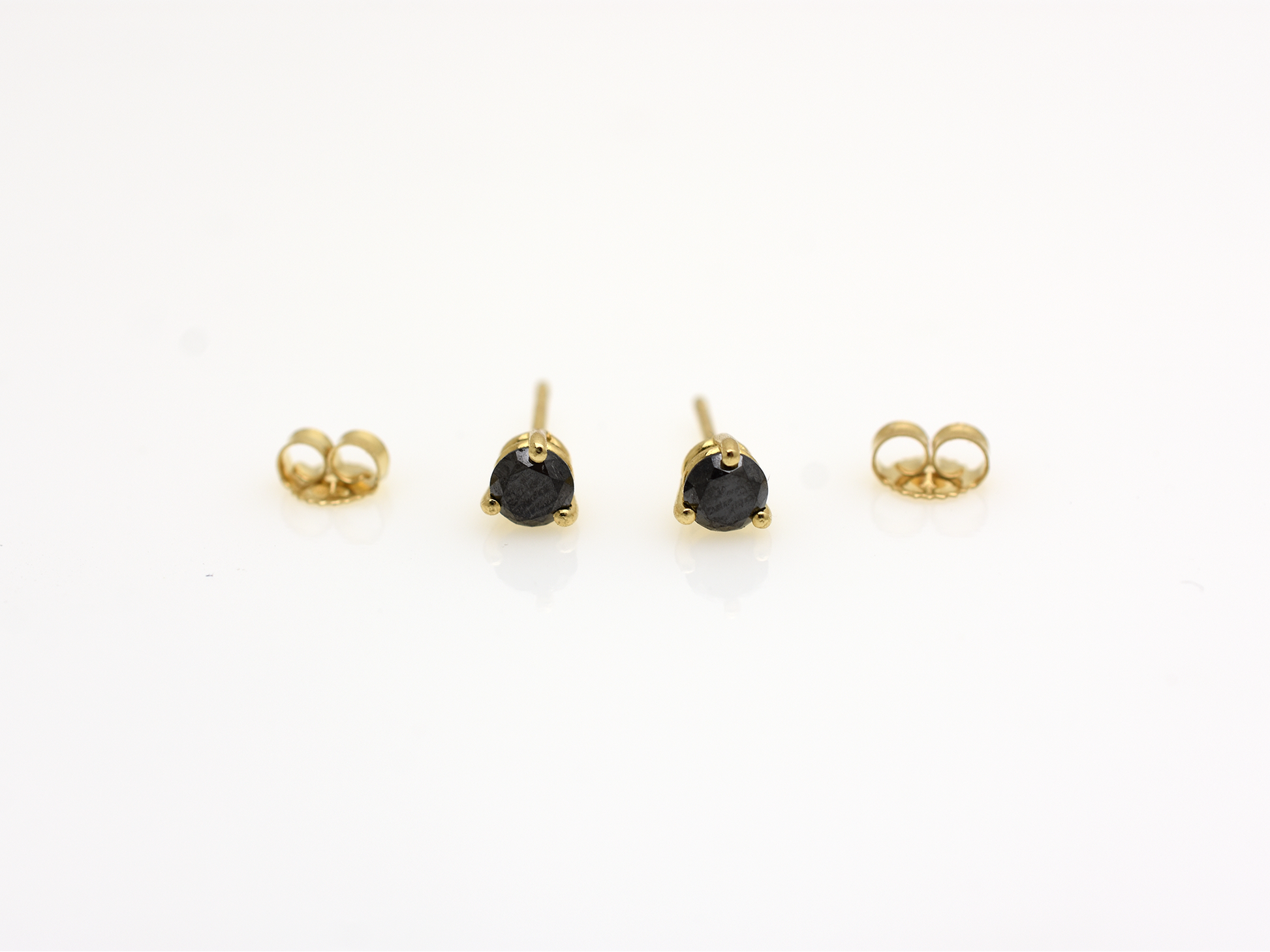 14k gold black diamond stud earrings with a 0.50 carat round shape black diamonds 