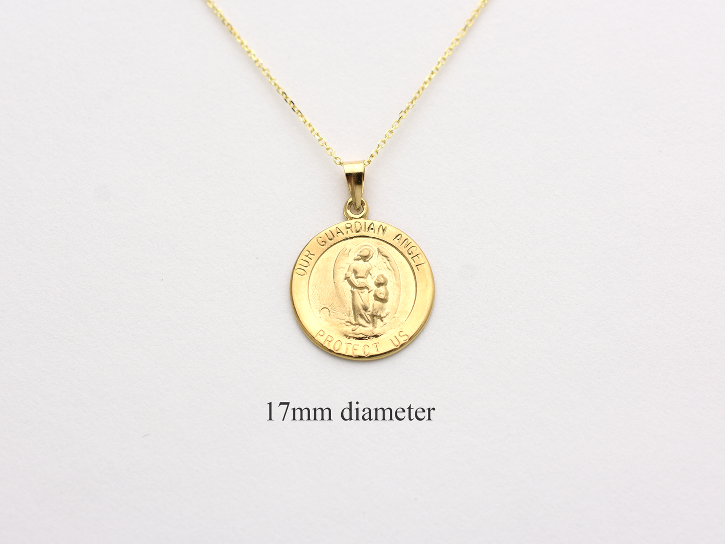 14k solid gold 17 mm Guardian Angel charm necklace .perfect for layering everyday look displayed on a white background . intended for all ages and for men and ladies