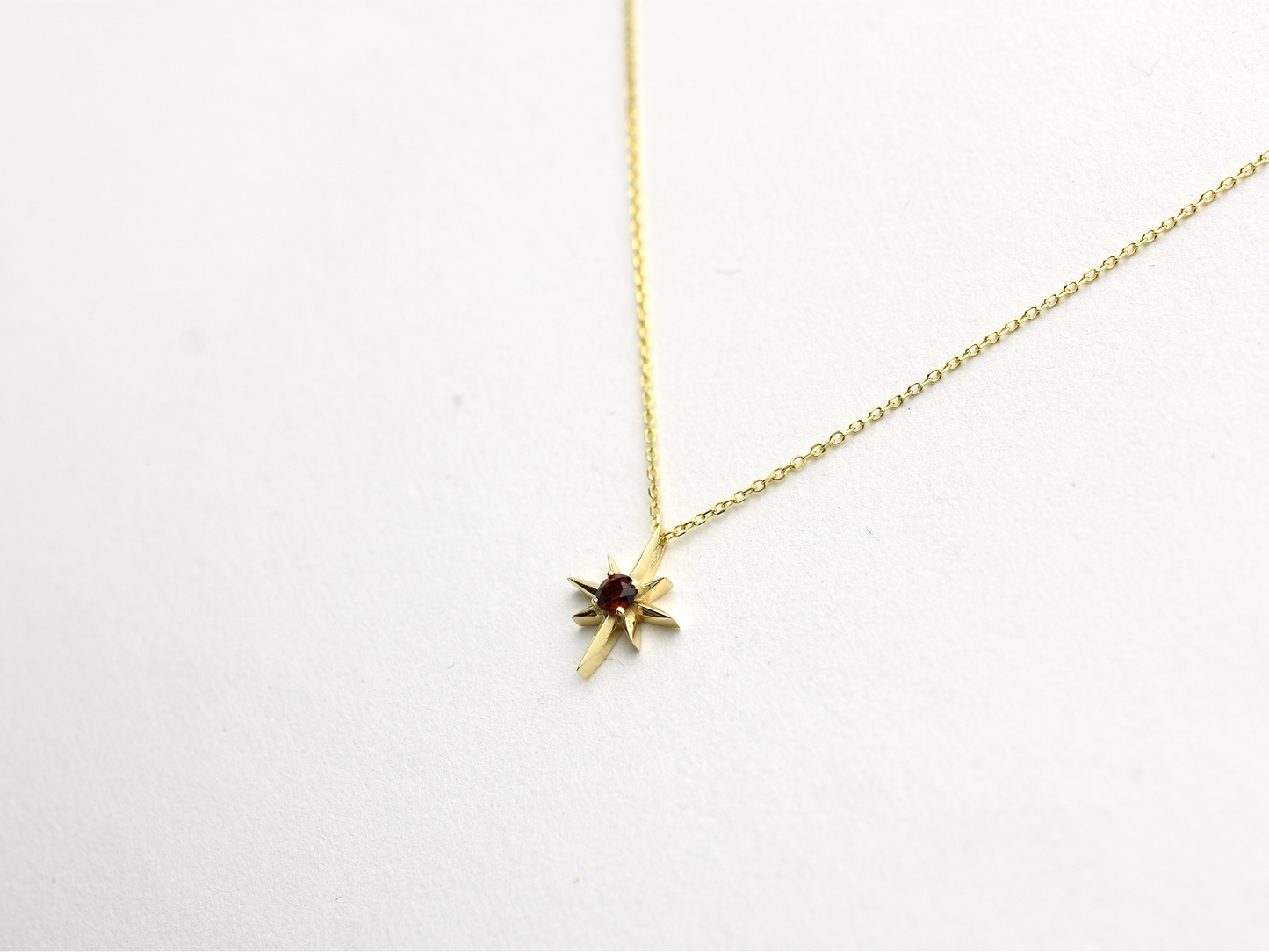 14k Gold Garnet North Star Necklace 0.10ct: Minimalist Starburst Pendant, January Birthstone Gift