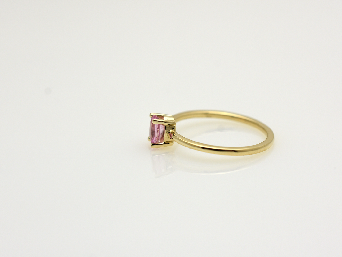 Natural pink sapphire ring in 14k gold with 0.56 carat oval stone, dainty fine jewelry gift, minimalist real gold side view