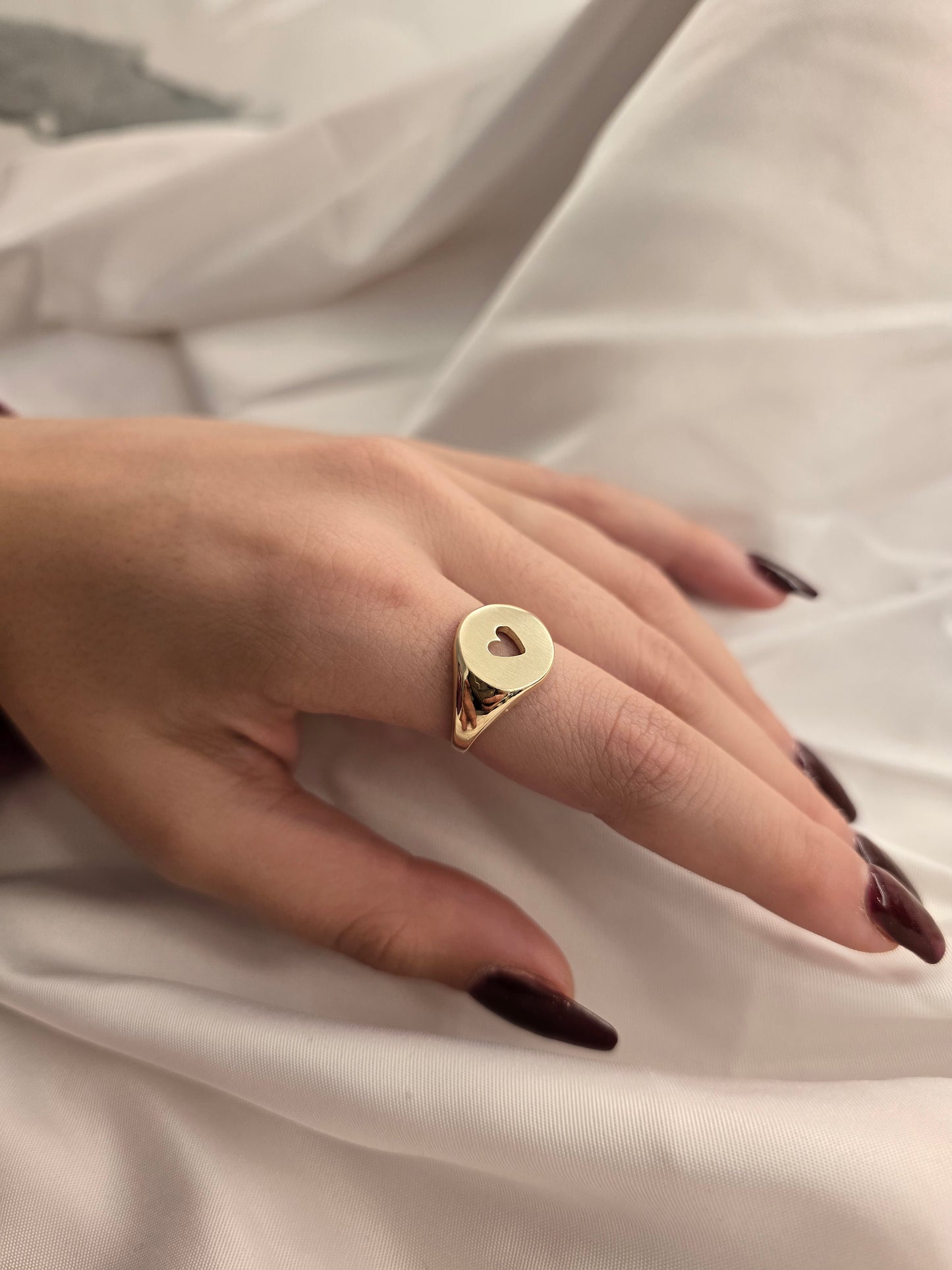 14k solid gold heart ring with a heart design