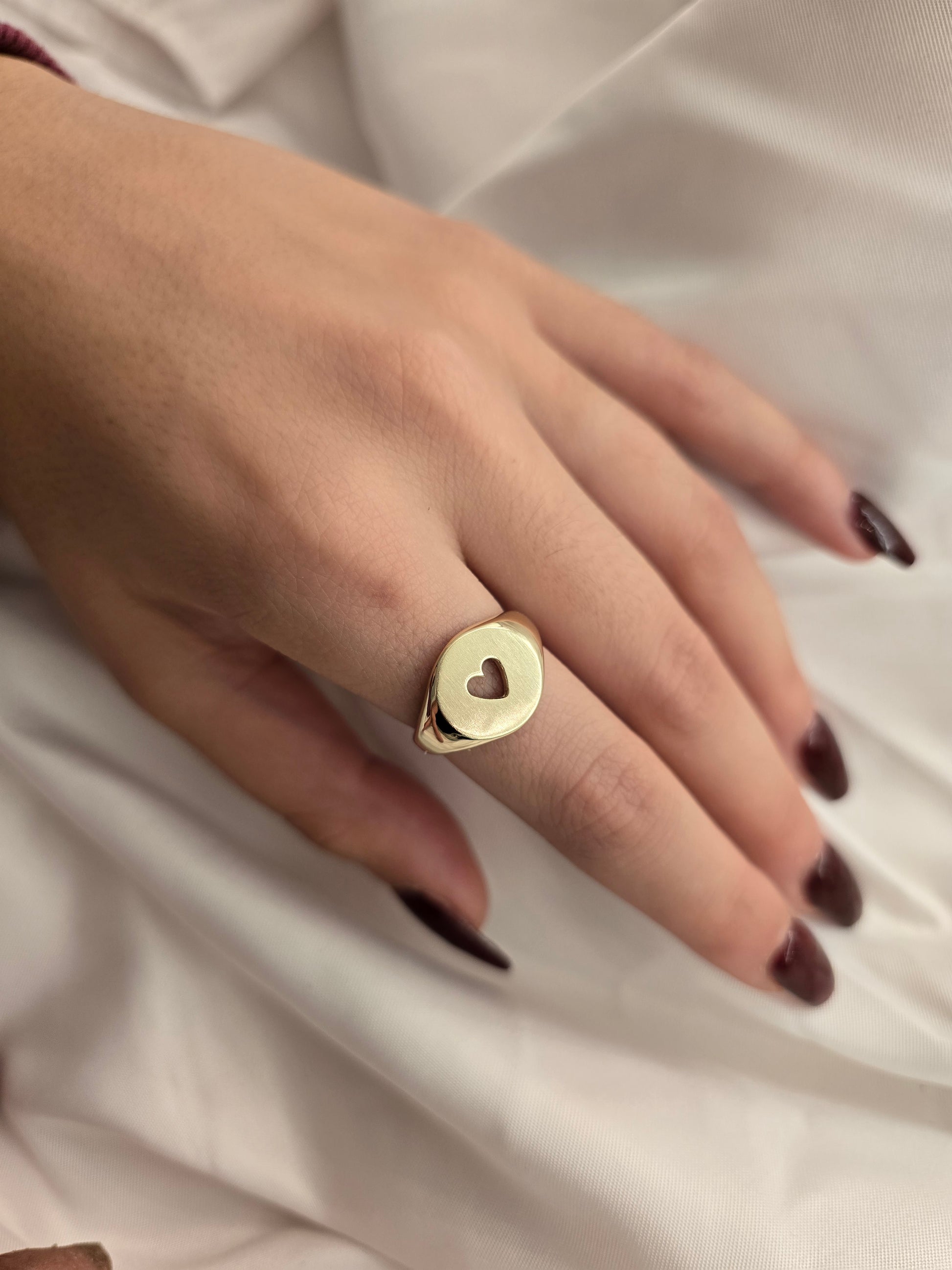 14k solid gold heart ring with a heart design