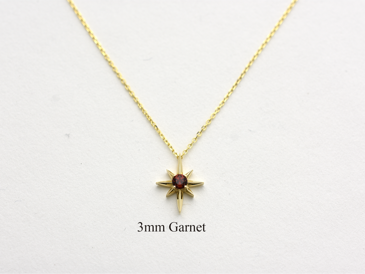 14k Gold Garnet North Star Necklace 0.10ct: Minimalist Starburst Pendant, January Birthstone Gift