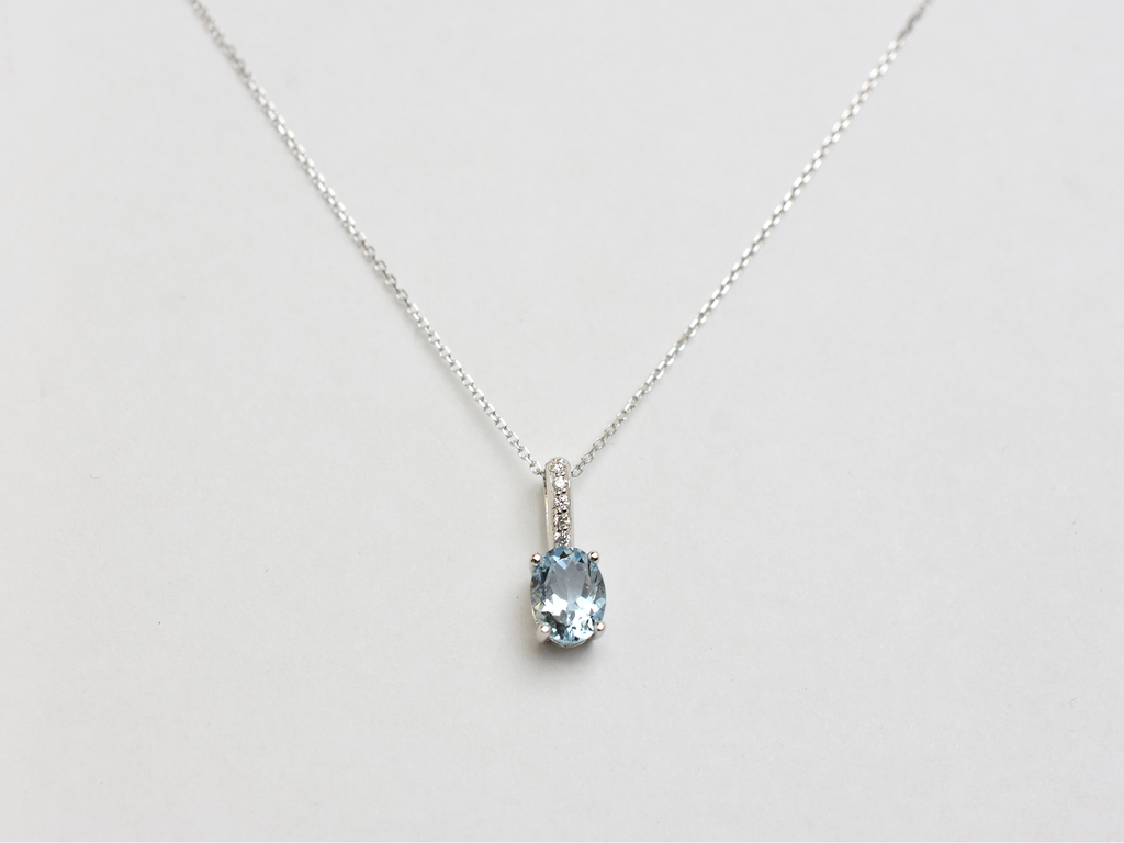 14k gold Oval aquamarine and diamond pendant