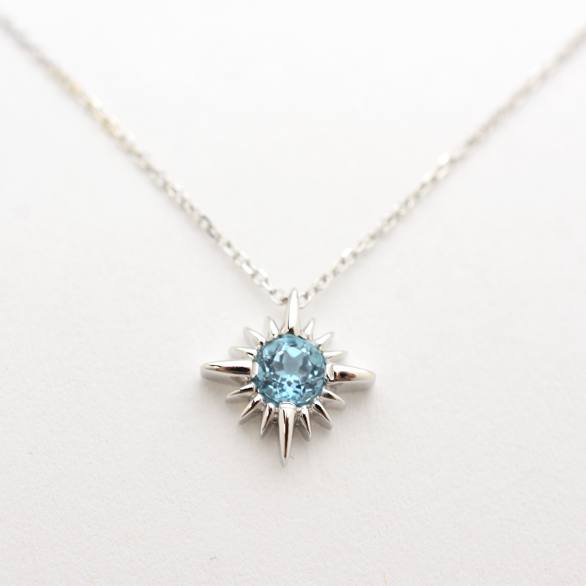 14k Swiss Blue Topaz North Star Necklace