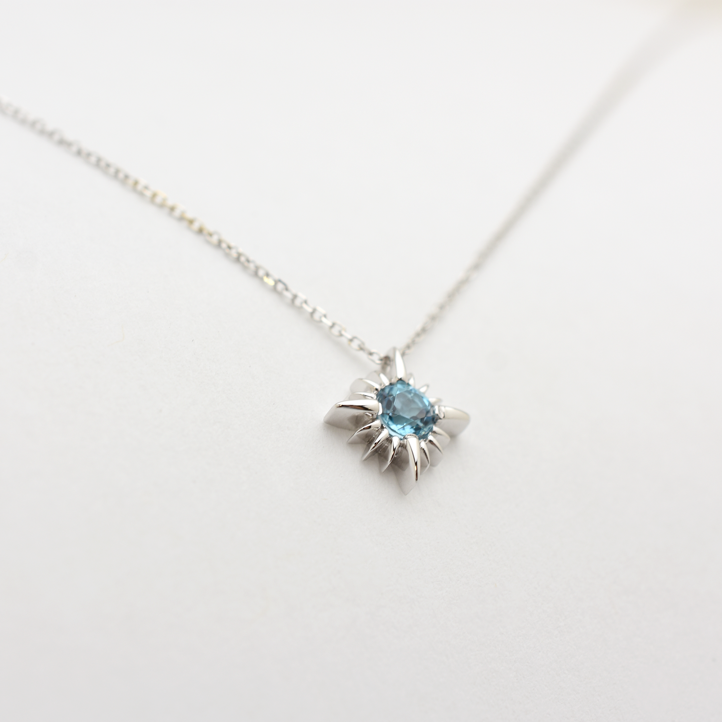 14k Swiss Blue Topaz North Star Necklace