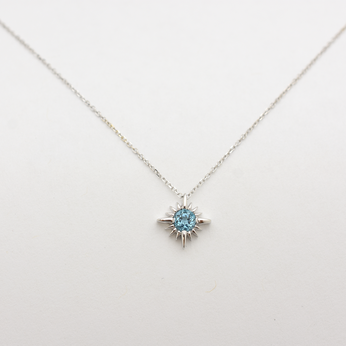 14k Swiss Blue Topaz North Star Necklace