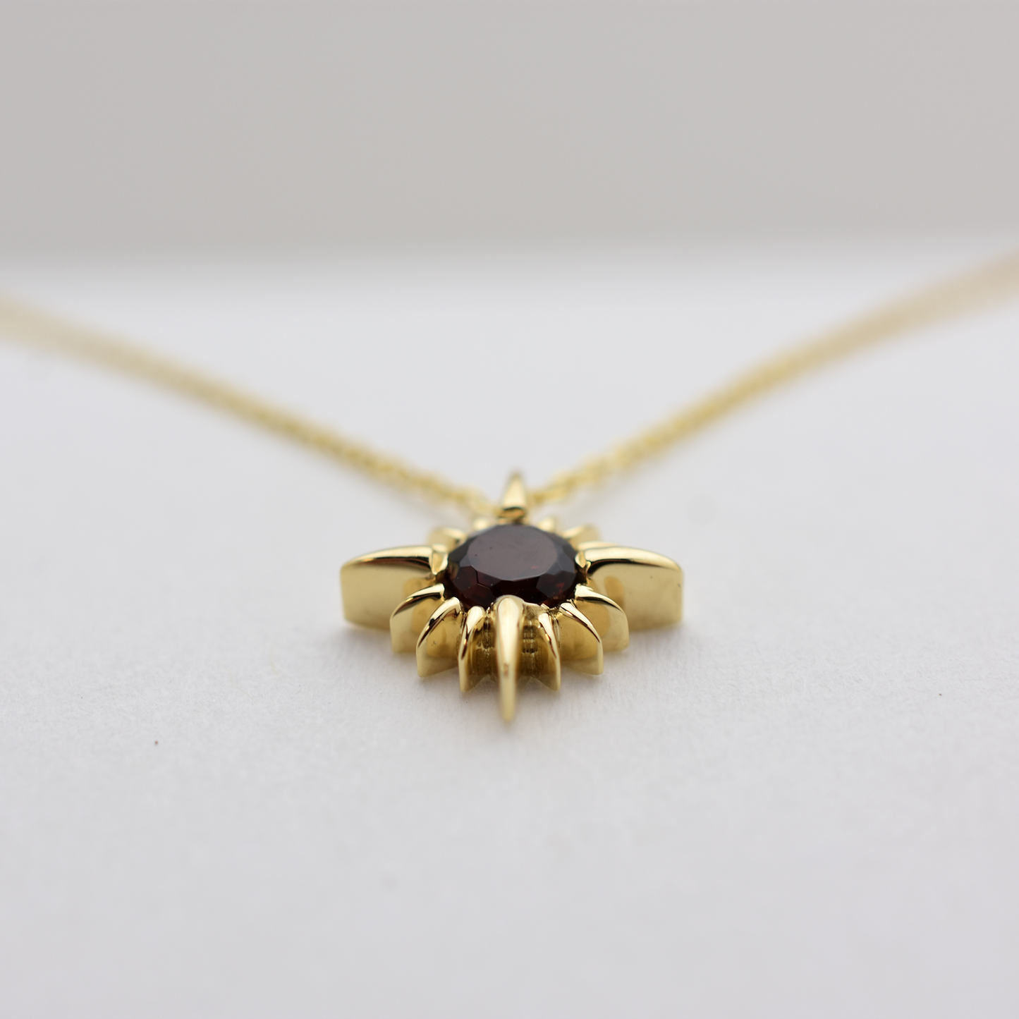 14k Garnet North Star Necklace