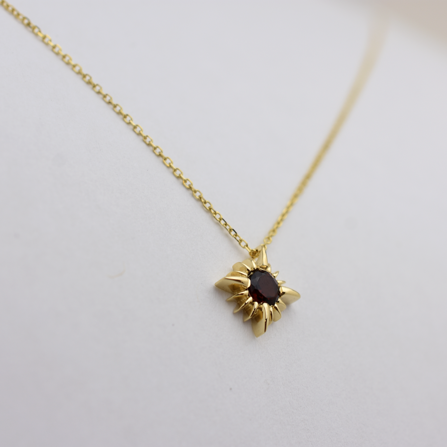 14k Garnet North Star Necklace