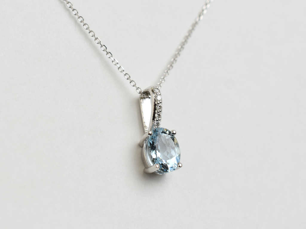 14k gold Oval aquamarine and diamond pendant