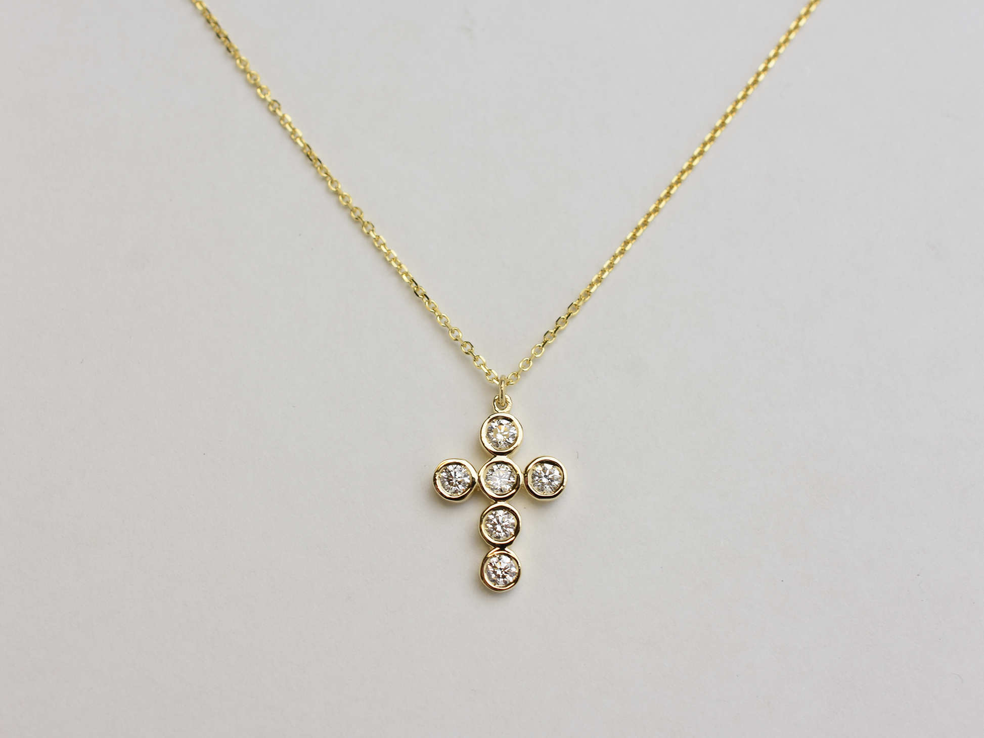 14k Gold diamond cross / 0.55 ct natural diamond cross / bezel diamond cross / baptism cross / layering necklace
This statement cross is 14k solid gold and 0.55 ct natural earth mined diamonds bezel set . The diamonds are SI 1 clarity and G color for that extra sparkle. the cross alone stands at 16 mm by 12 mm dimension.
i also make this cross in 3 other sizes , this one being the largest one. please contact me for more info.
Available in 14 k white gold , 14 k yellow gold, 14 k rose gold. The chain is 14 k