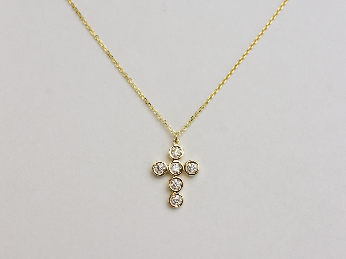 14k Gold diamond cross / 0.55 ct natural diamond cross / bezel diamond cross / baptism cross / layering necklace
This statement cross is 14k solid gold and 0.55 ct natural earth mined diamonds bezel set . The diamonds are SI 1 clarity and G color for that extra sparkle. the cross alone stands at 16 mm by 12 mm dimension.
i also make this cross in 3 other sizes , this one being the largest one. please contact me for more info.
Available in 14 k white gold , 14 k yellow gold, 14 k rose gold. The chain is 14 k