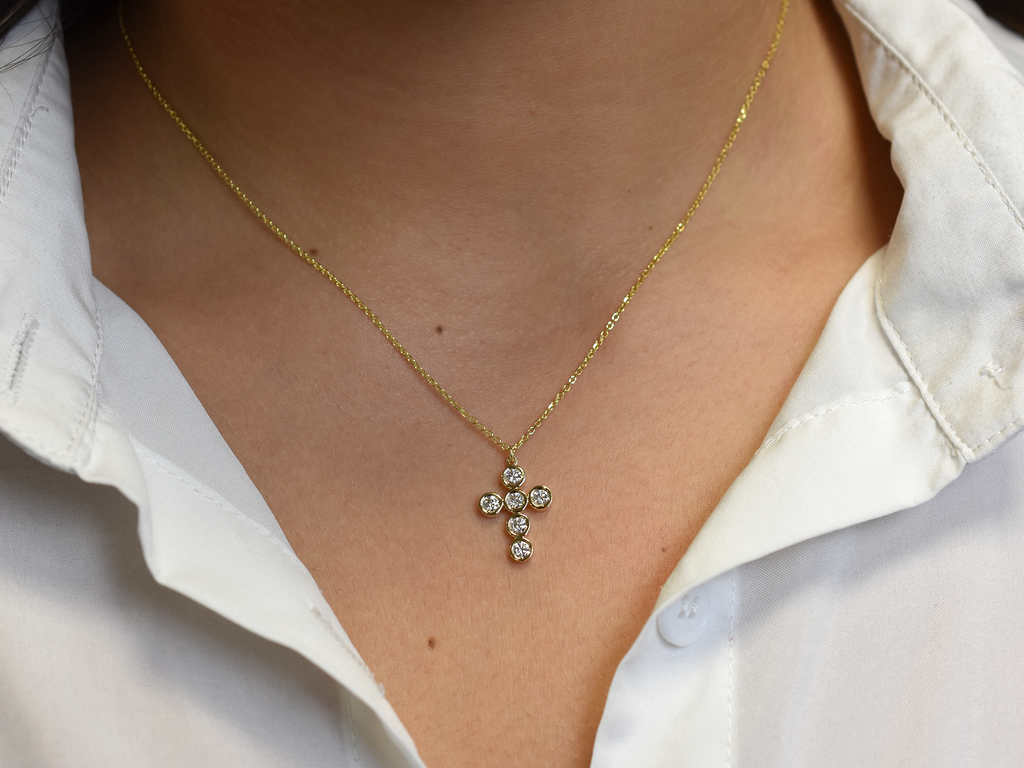 14k Gold diamond cross / 0.55 ct natural diamond cross / bezel diamond cross / baptism cross / layering necklace
This statement cross is 14k solid gold and 0.55 ct natural earth mined diamonds bezel set . The diamonds are SI 1 clarity and G color for that extra sparkle. the cross alone stands at 16 mm by 12 mm dimension.
i also make this cross in 3 other sizes , this one being the largest one. please contact me for more info.
Available in 14 k white gold , 14 k yellow gold, 14 k rose gold. The chain is 14 k