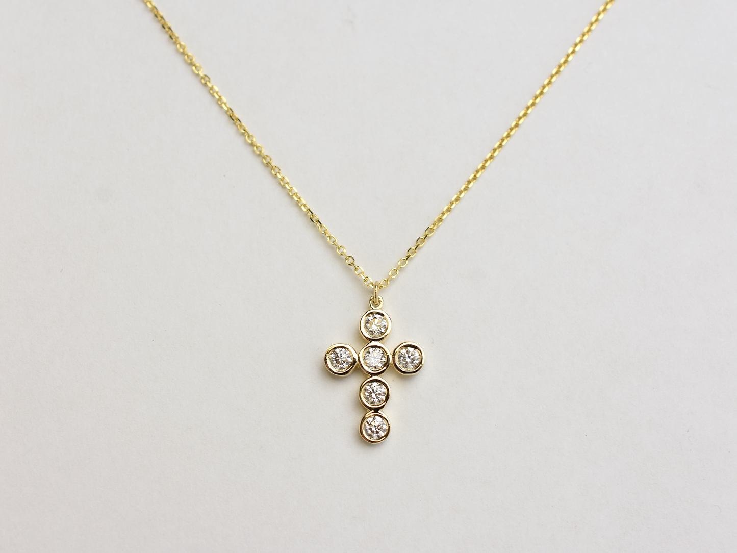 14k Gold diamond cross / 0.55 ct natural diamond cross / bezel diamond cross / baptism cross / layering necklace
This statement cross is 14k solid gold and 0.55 ct natural earth mined diamonds bezel set . The diamonds are SI 1 clarity and G color for that extra sparkle. the cross alone stands at 16 mm by 12 mm dimension.
i also make this cross in 3 other sizes , this one being the largest one. please contact me for more info.
Available in 14 k white gold , 14 k yellow gold, 14 k rose gold. The chain is 14 k