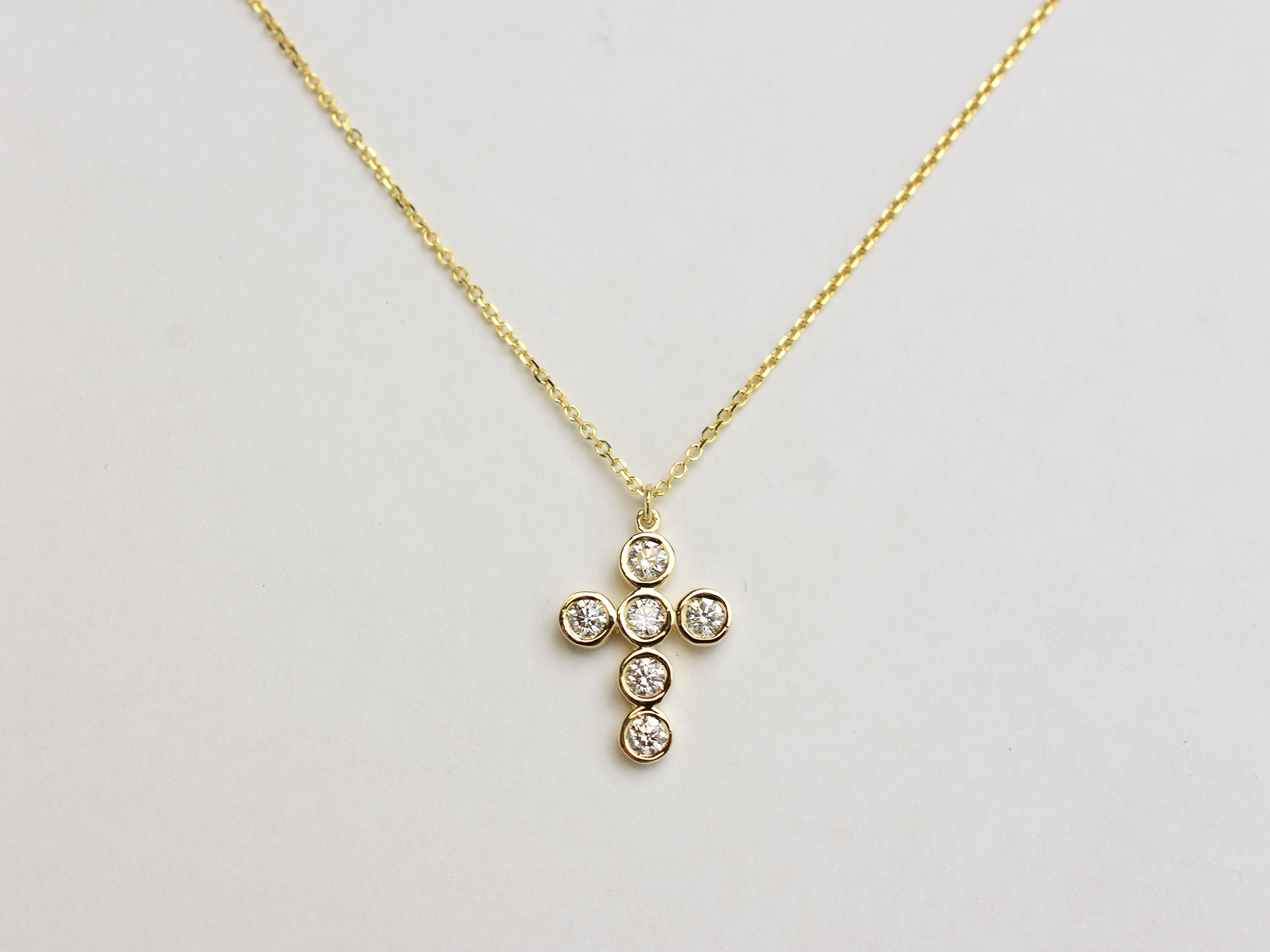 14k Gold diamond cross / 0.55 ct natural diamond cross / bezel diamond cross / baptism cross / layering necklace
This statement cross is 14k solid gold and 0.55 ct natural earth mined diamonds bezel set . The diamonds are SI 1 clarity and G color for that extra sparkle. the cross alone stands at 16 mm by 12 mm dimension.
i also make this cross in 3 other sizes , this one being the largest one. please contact me for more info.
Available in 14 k white gold , 14 k yellow gold, 14 k rose gold. The chain is 14 k