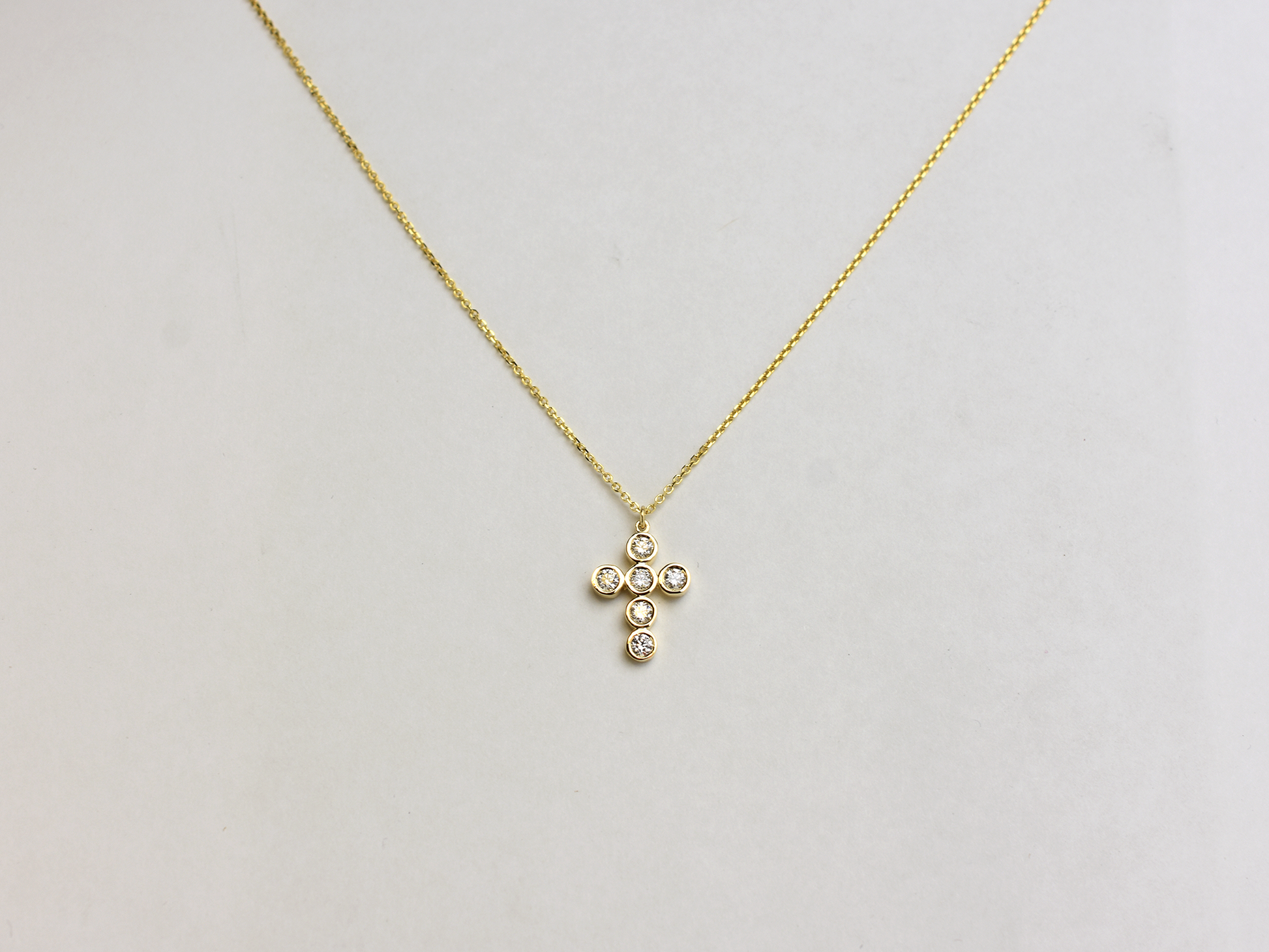 14k Gold diamond cross / 0.55 ct natural diamond cross / bezel diamond cross / baptism cross / layering necklace
This statement cross is 14k solid gold and 0.55 ct natural earth mined diamonds bezel set . The diamonds are SI 1 clarity and G color for that extra sparkle. the cross alone stands at 16 mm by 12 mm dimension.
i also make this cross in 3 other sizes , this one being the largest one. please contact me for more info.
Available in 14 k white gold , 14 k yellow gold, 14 k rose gold. The chain is 14 k