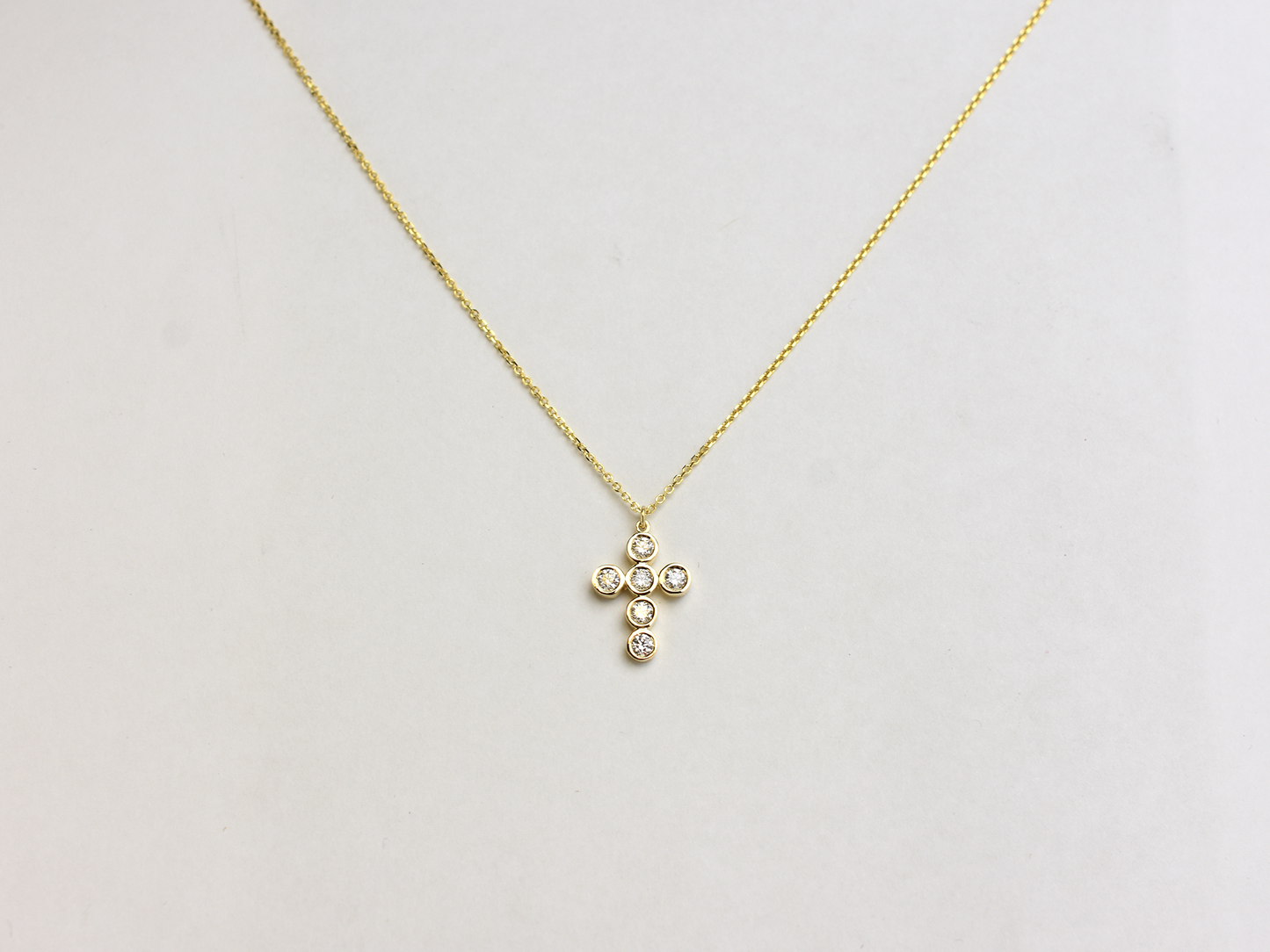 14k Gold diamond cross / 0.55 ct natural diamond cross / bezel diamond cross / baptism cross / layering necklace
This statement cross is 14k solid gold and 0.55 ct natural earth mined diamonds bezel set . The diamonds are SI 1 clarity and G color for that extra sparkle. the cross alone stands at 16 mm by 12 mm dimension.
i also make this cross in 3 other sizes , this one being the largest one. please contact me for more info.
Available in 14 k white gold , 14 k yellow gold, 14 k rose gold. The chain is 14 k