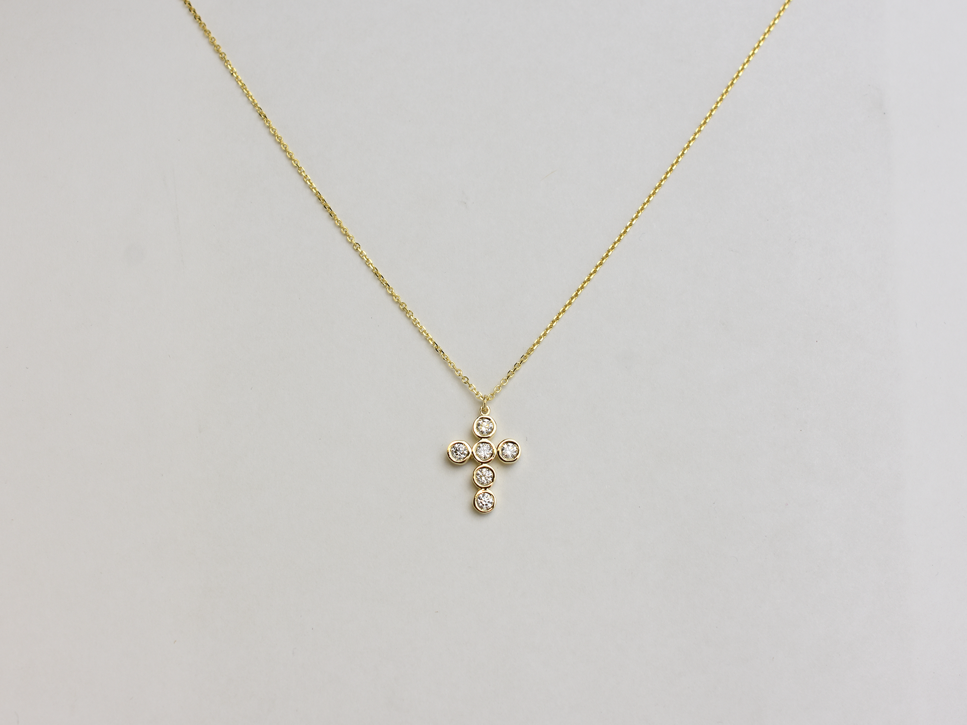 14k Gold diamond cross / 0.55 ct natural diamond cross / bezel diamond cross / baptism cross / layering necklace
This statement cross is 14k solid gold and 0.55 ct natural earth mined diamonds bezel set . The diamonds are SI 1 clarity and G color for that extra sparkle. the cross alone stands at 16 mm by 12 mm dimension.
i also make this cross in 3 other sizes , this one being the largest one. please contact me for more info.
Available in 14 k white gold , 14 k yellow gold, 14 k rose gold. The chain is 14 k