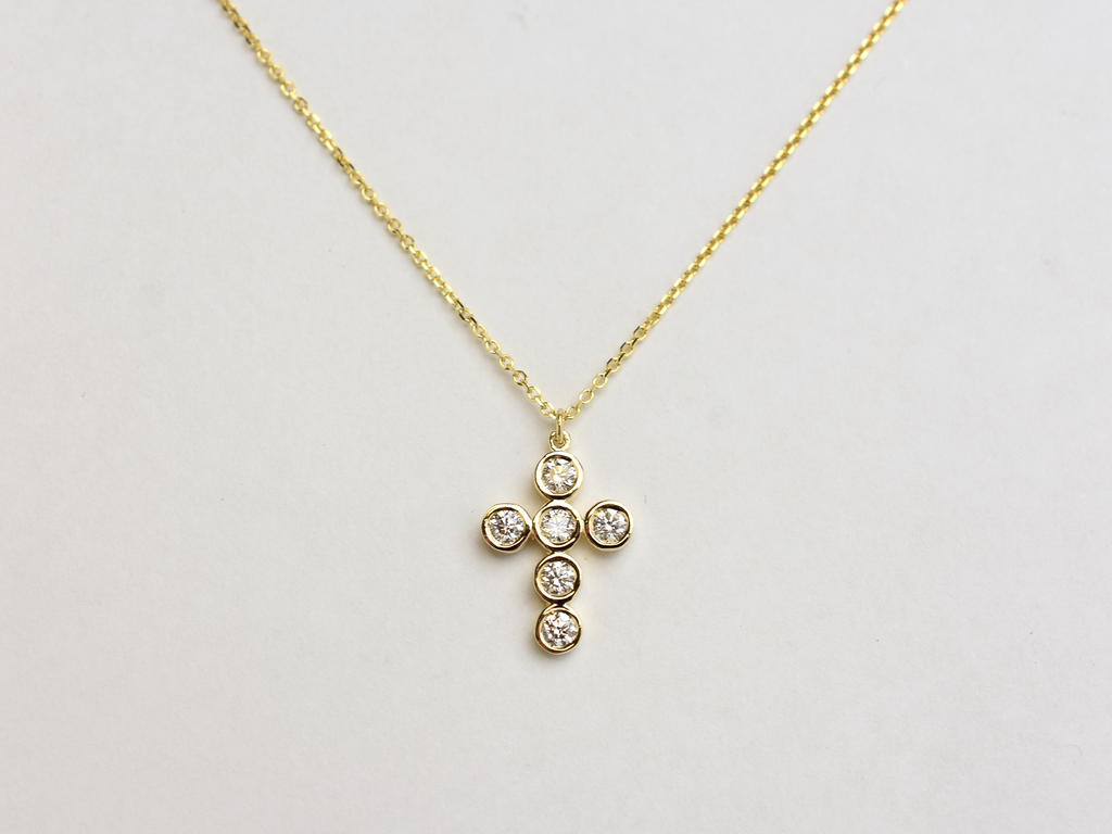 14k Gold diamond cross / 0.55 ct natural diamond cross / bezel diamond cross / baptism cross / layering necklace
This statement cross is 14k solid gold and 0.55 ct natural earth mined diamonds bezel set . The diamonds are SI 1 clarity and G color for that extra sparkle. the cross alone stands at 16 mm by 12 mm dimension.
i also make this cross in 3 other sizes , this one being the largest one. please contact me for more info.
Available in 14 k white gold , 14 k yellow gold, 14 k rose gold. The chain is 14 k