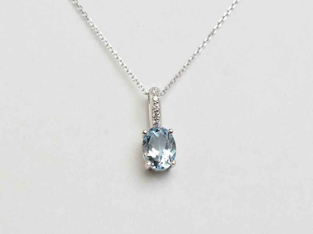 14k gold Oval aquamarine and diamond pendant