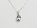 14k gold Oval aquamarine and diamond pendant