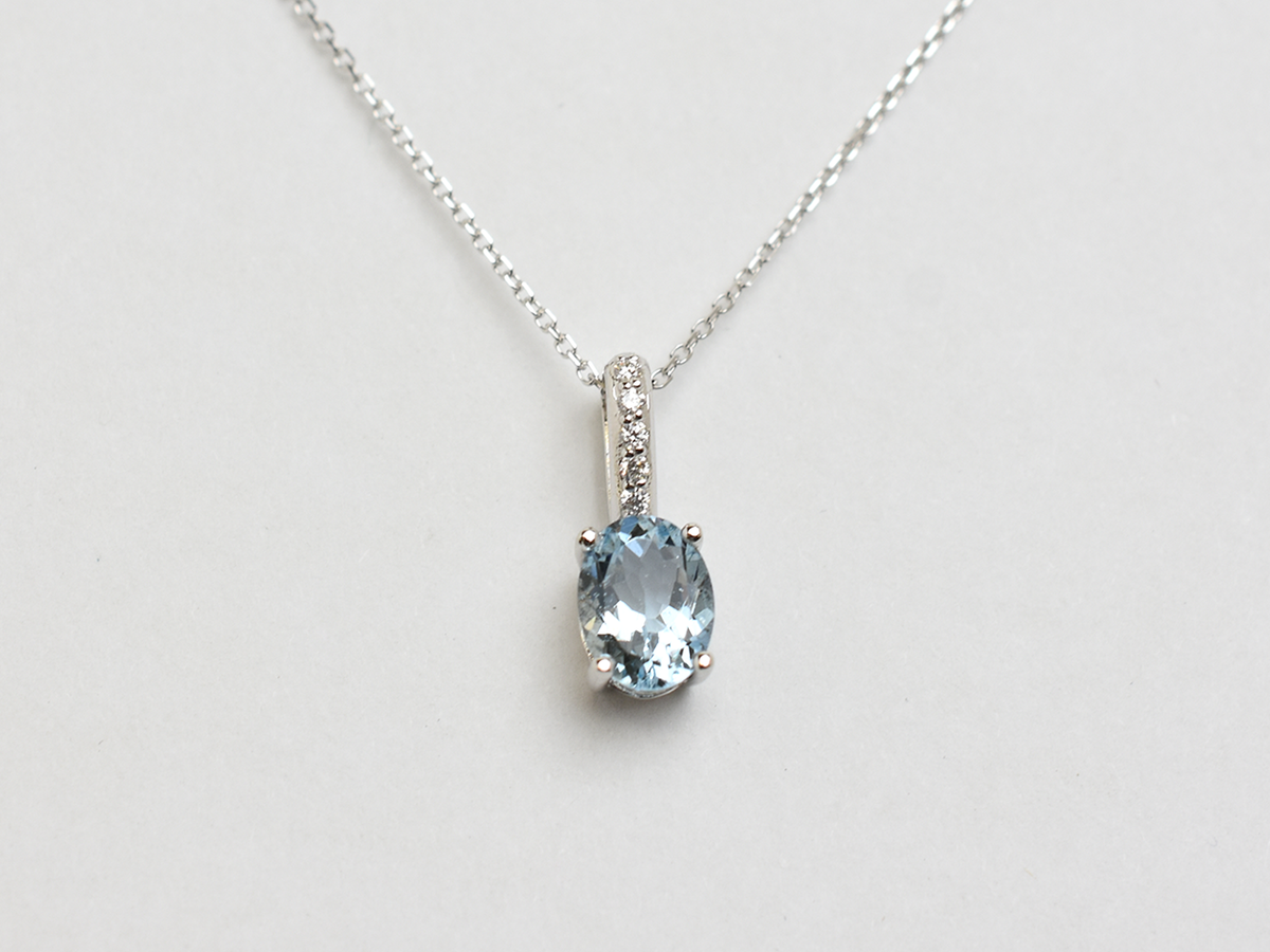 14k gold Oval aquamarine and diamond pendant