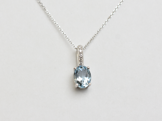 14k gold Oval aquamarine and diamond pendant