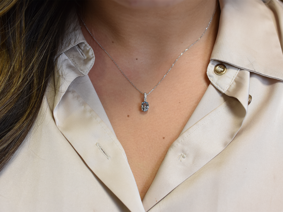 14k gold Oval aquamarine and diamond pendant