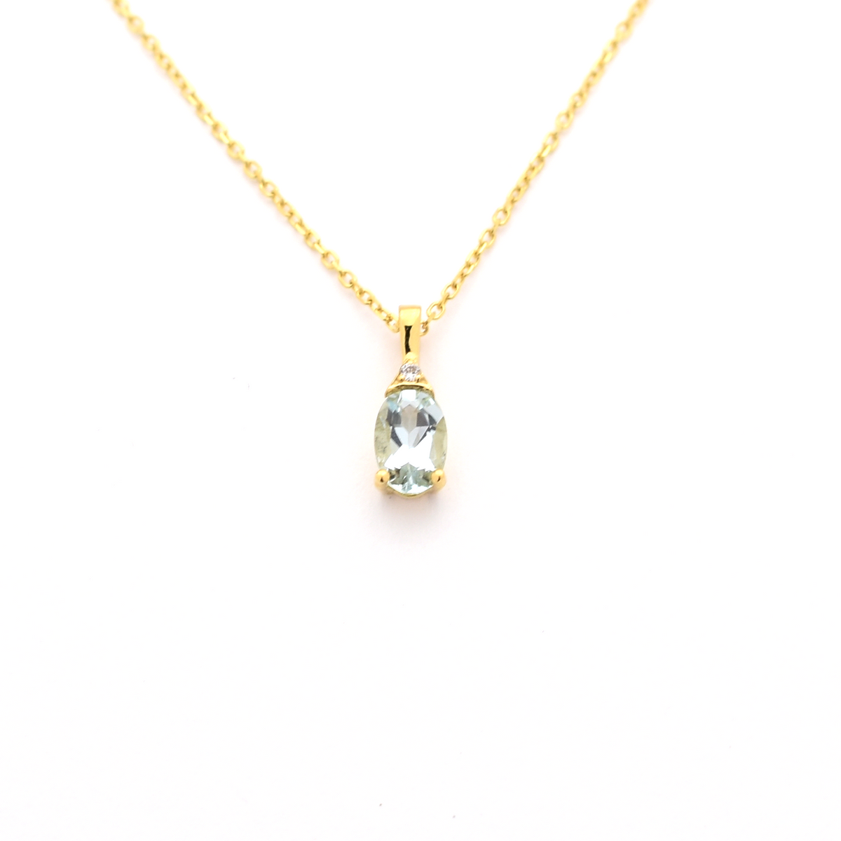 Oval Aquamarine and diamond pendant