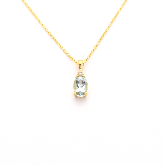 Oval Aquamarine and diamond pendant