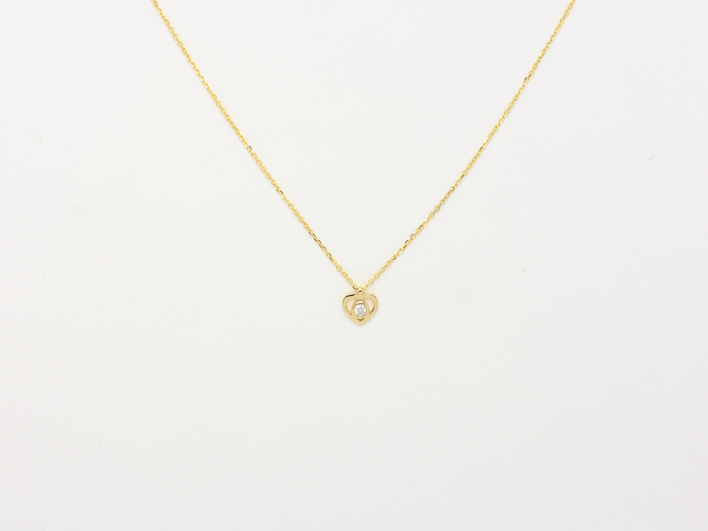 14k solid gold Heart necklace with one diamond in the center