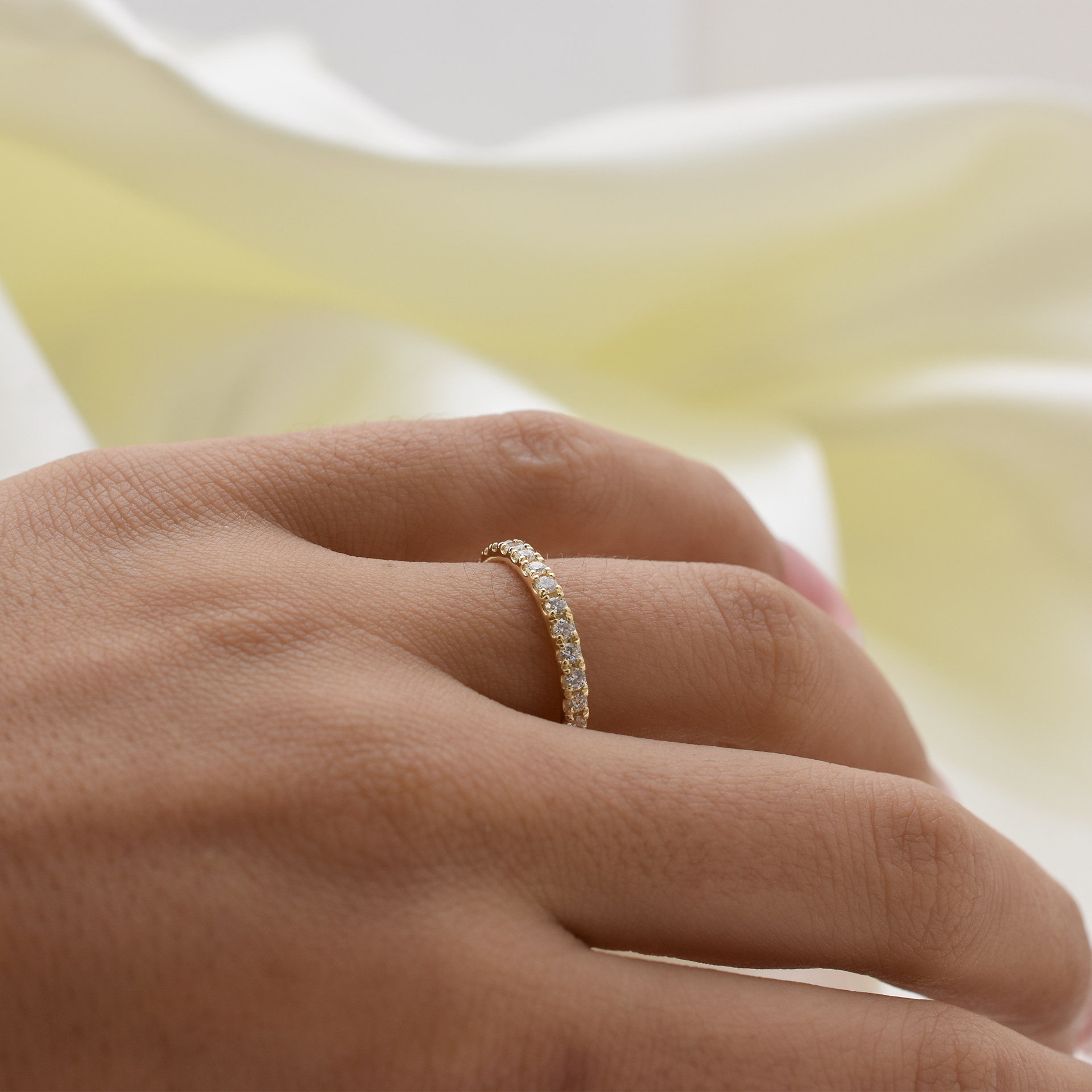 Thin diamond eternity ring