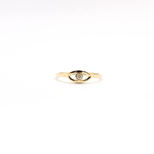 A 14K yellow gold ring featuring a round diamond set in a white gold band, known as the 'Diamond Evil Eye'.