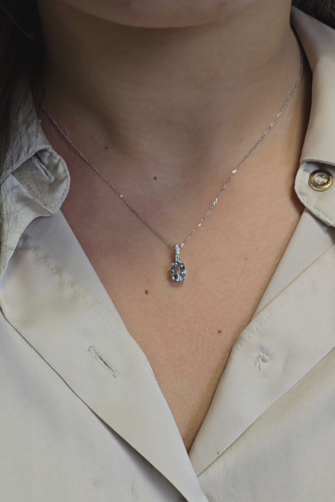 14k gold Oval aquamarine and diamond pendant