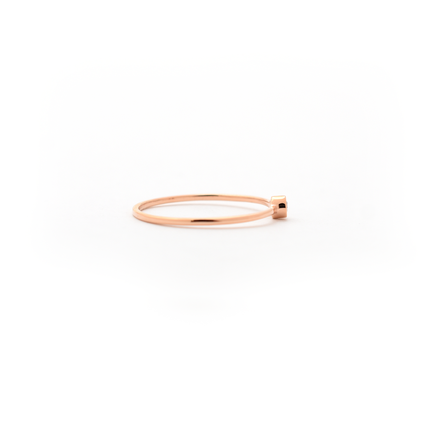 delicate bezel set diamond ring