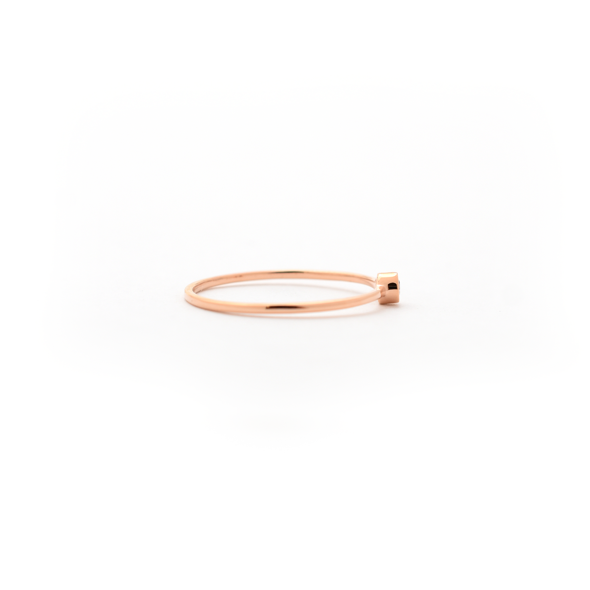 delicate bezel set diamond ring