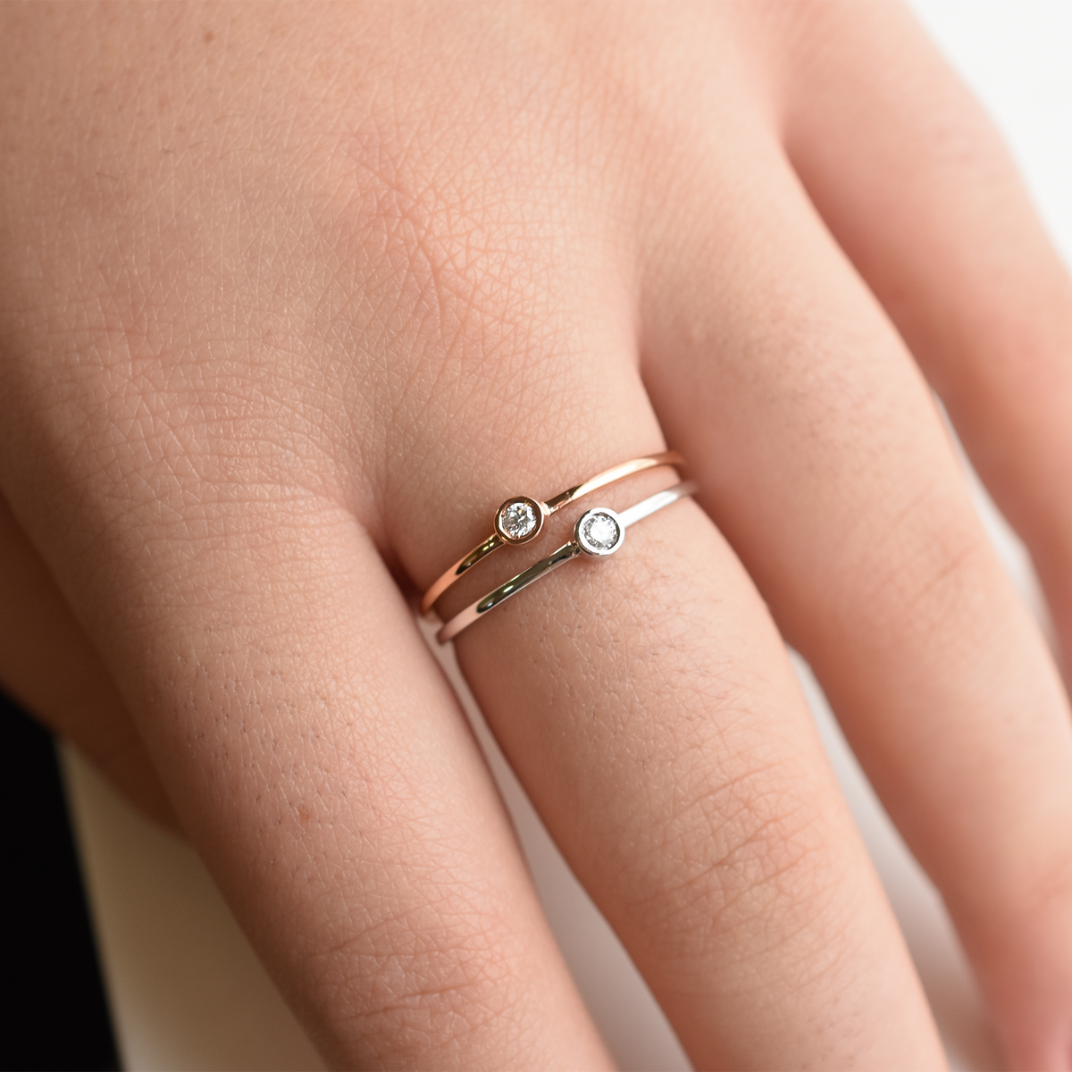 delicate bezel set diamond ring