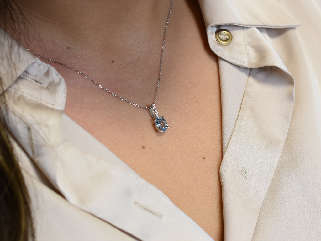 14k gold Oval aquamarine and diamond pendant