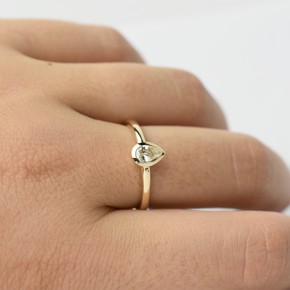14k Diamond Pear Shaped Bezel Ring
