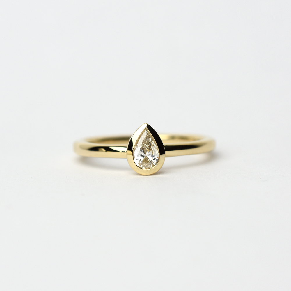 14k Diamond Pear Shaped Bezel Ring