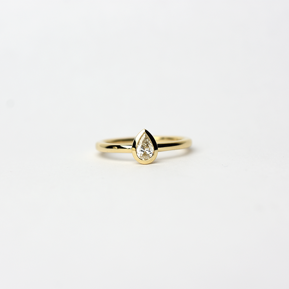 14k Diamond Pear Shaped Bezel Ring