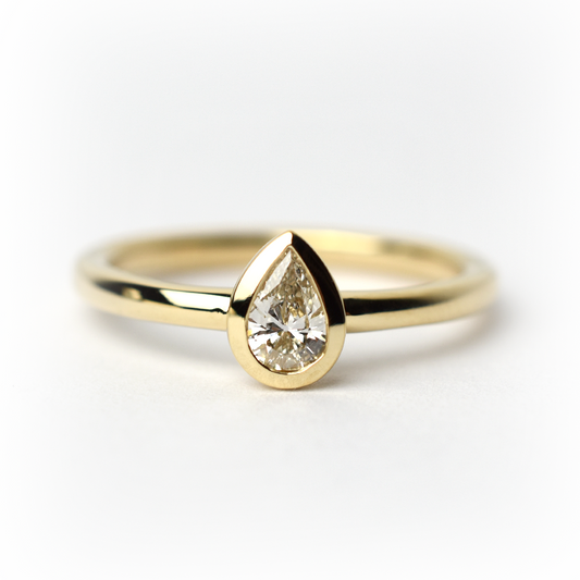 14k Diamond Pear Shaped Bezel Ring