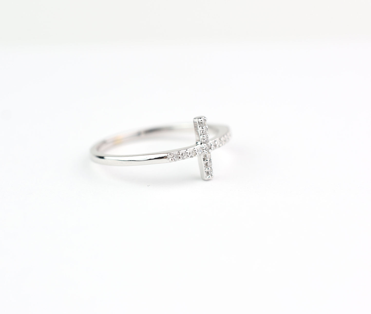 gold and diamond cross ring