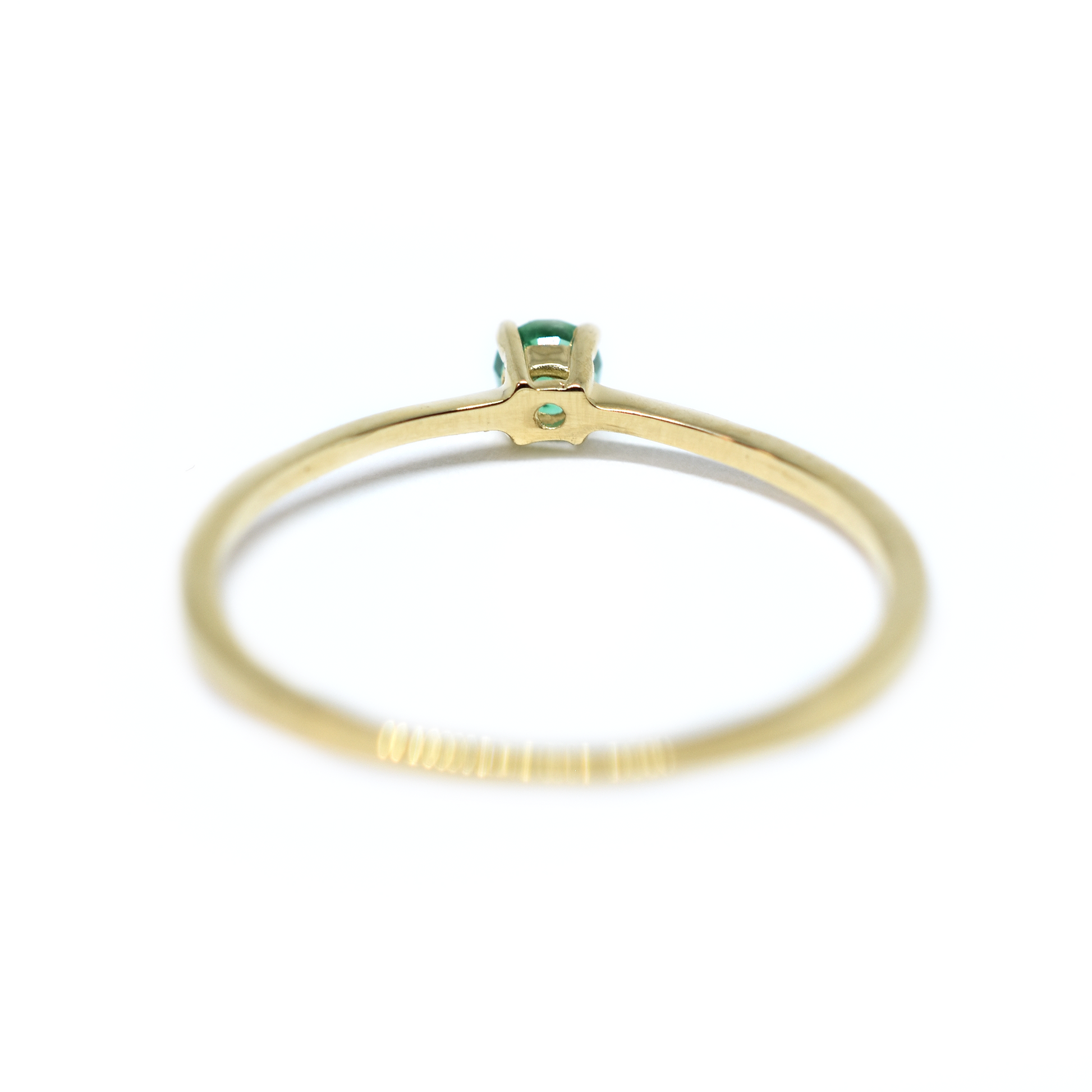 back of emerald ring
