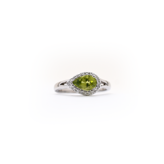 14 k white gold pear shaped peridot and diamond ring